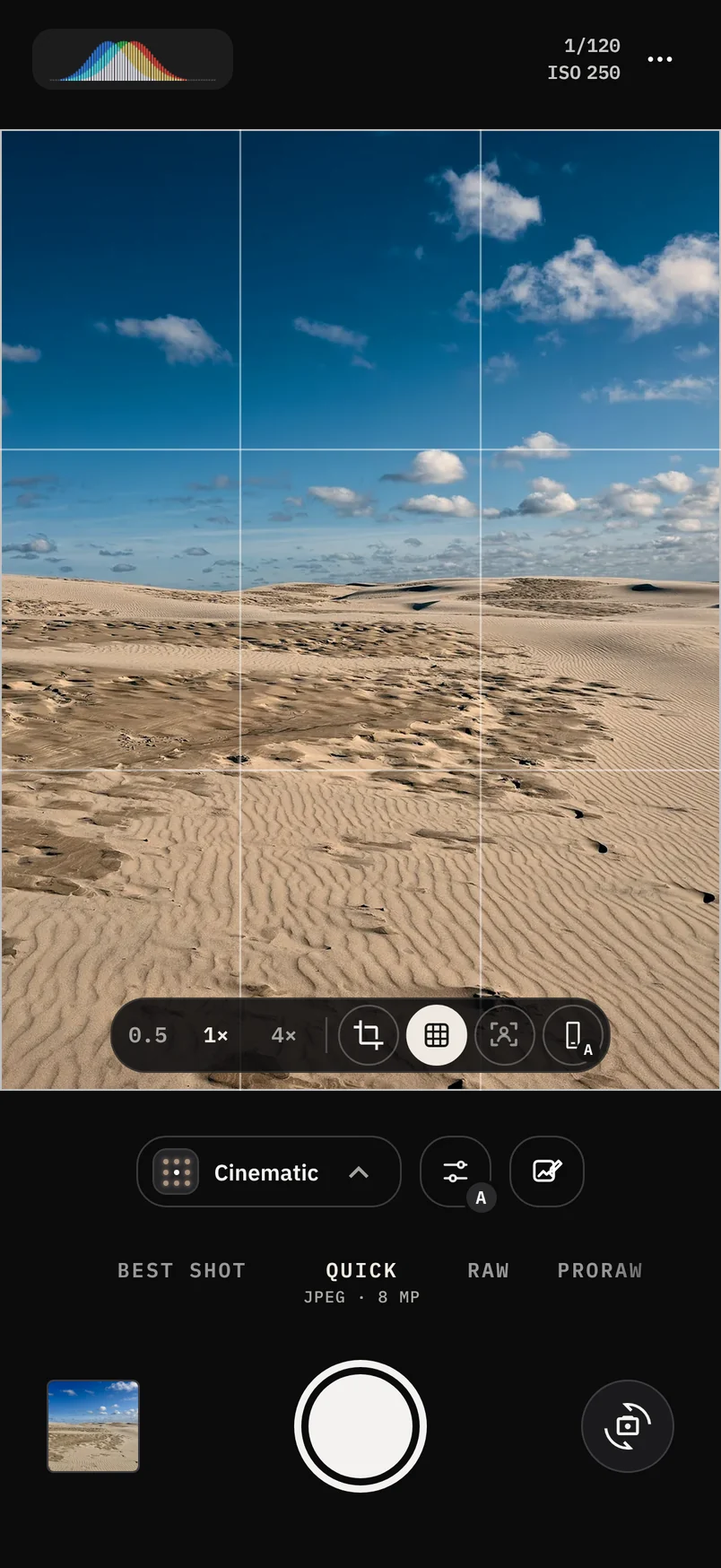 The C Cam camera on a sunny dune with the Cinematic style, the last photo in the corner